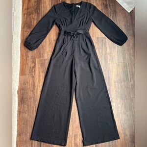 Elegant Black Long-Sleeve V-Neck Jumpsuit with Waist Tie